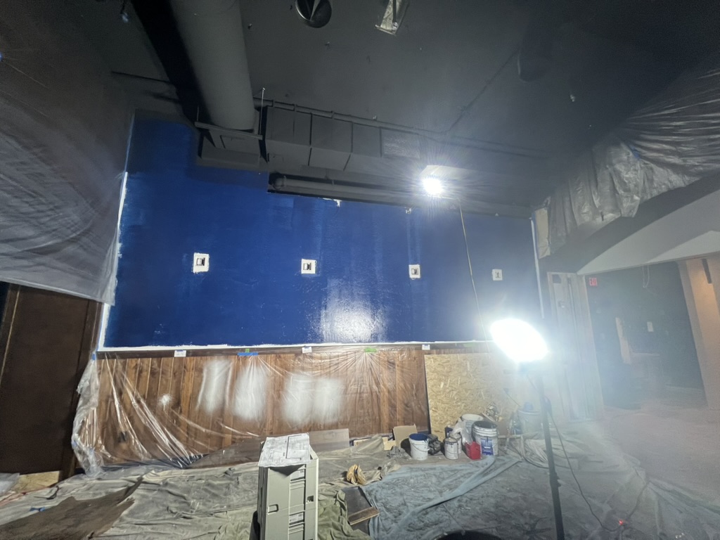 Commercial interior painting with blue accent wall